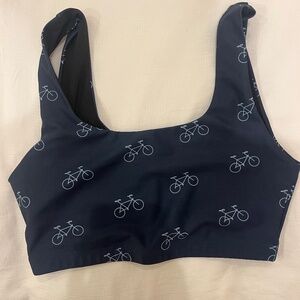 SOULCYCLE navy sports bra top with light blue bicycles.